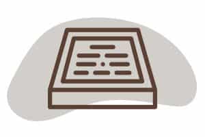 Brown line drawing of a rectangular plaque or tablet with horizontal lines representing text, set against a light gray abstract background shape.